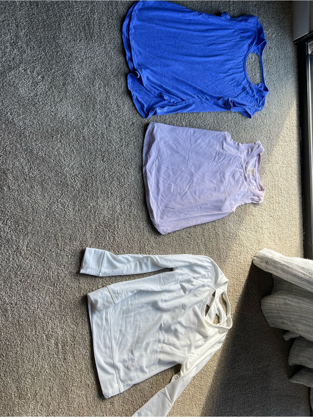 Women’s workout gear - capris AND three tops